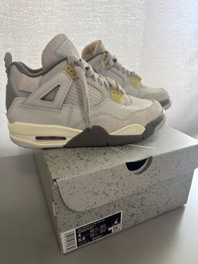 Jordan Retro 4 Sneakers in Grey and Cream